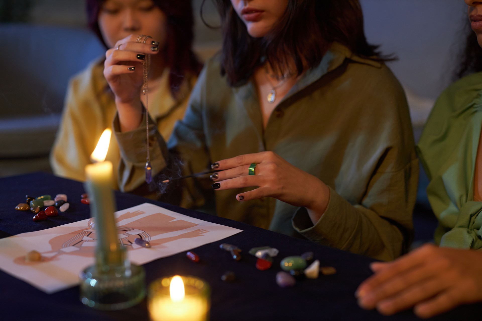 Three Girls Studying Aura During Party